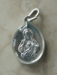 Medalik dwustronny  św. Rita i Pan Jezus - oblany żywicą